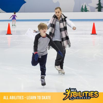 An ice skating coach is instructing a child on how to do a one foot glide