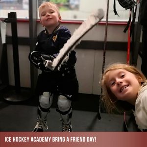 Young boy hockey player and his sister