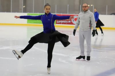 FIgure skating coach Sean Abrams in a lesson with a student